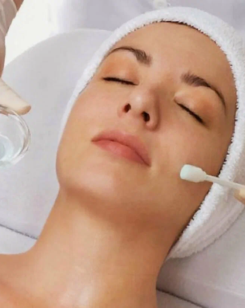 Pofessional chemical peel treatment to exfoliate dead skin cells, improve texture, and reduce the appearance of hyperpigmentation